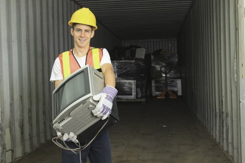 Professional team handling garden waste removal